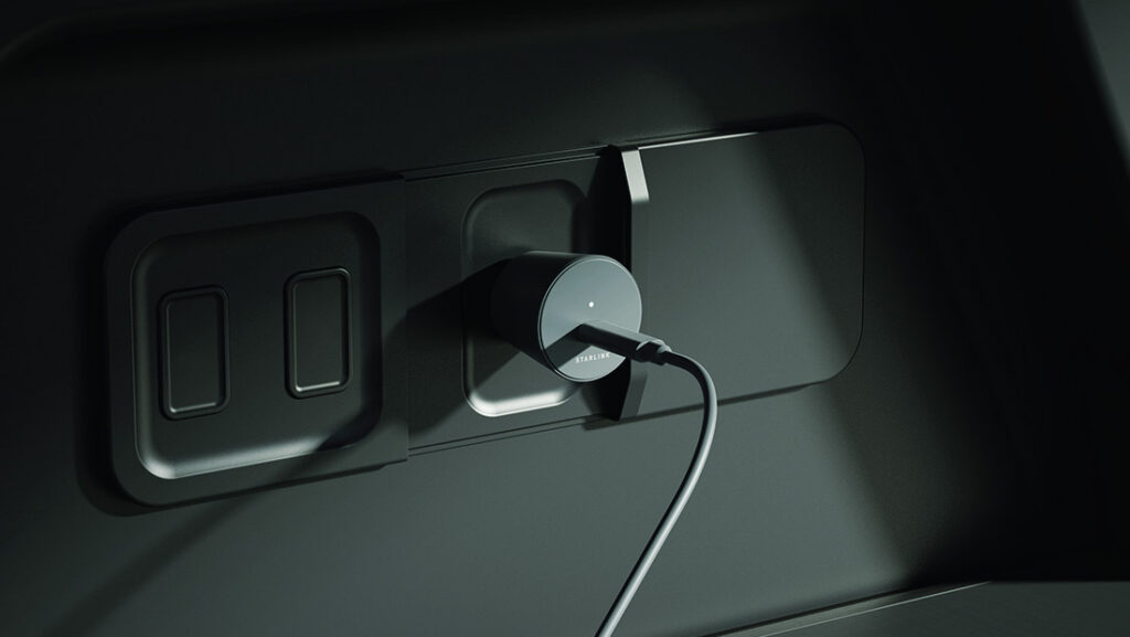 Manufacturer illustration of the Mini Car Adapter plugged into an automotive auxiliary socket with a USB-C cable attached.